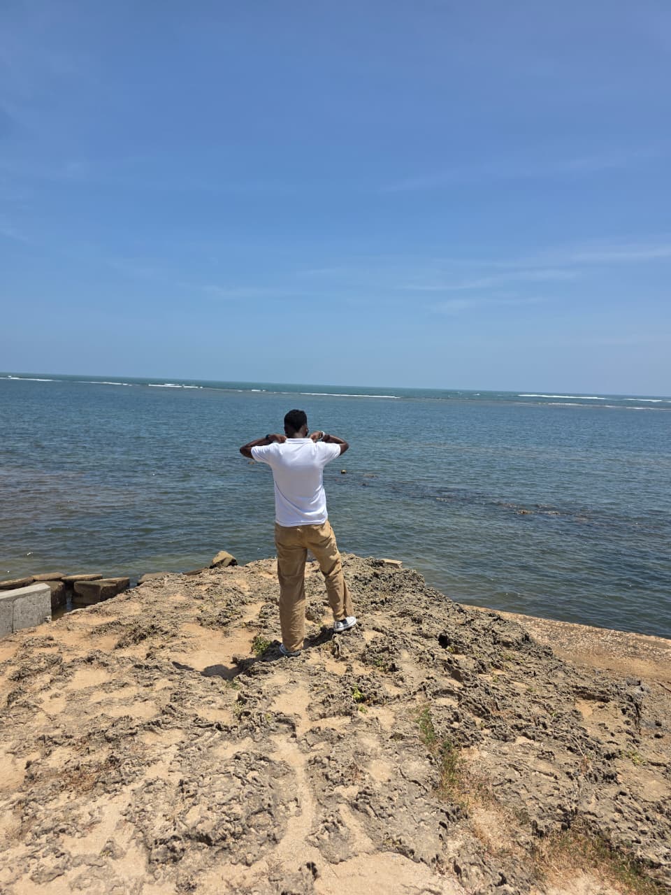 Lewis Muturi by the coast